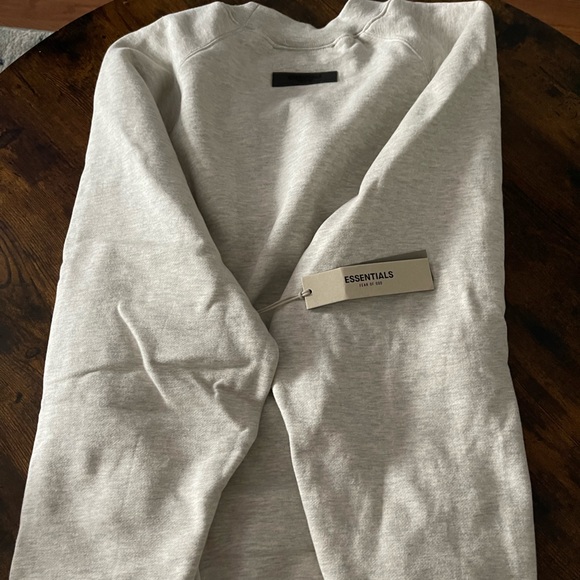 Brand New never worn Fear of God essentials crew neck sweater. The color Oatmeal - Picture 3 of 4